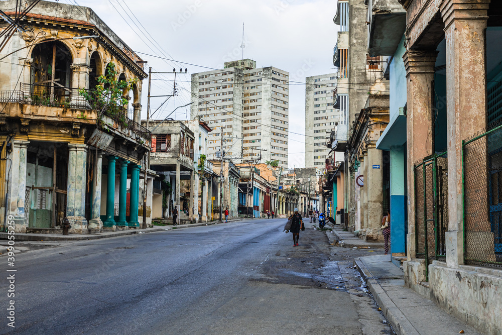 HAVANA, CUBA - DECEMBER 12, 2019: Havana Old Town Street with Local People and Tourist. Cuba.