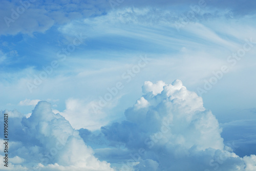 Blue tone of evening cloud and sky before sunset. Peaceful sky in calm atmosphere. A fluctuation weather make a dreamy and imaginative cloudscape. Wide blue sky background.