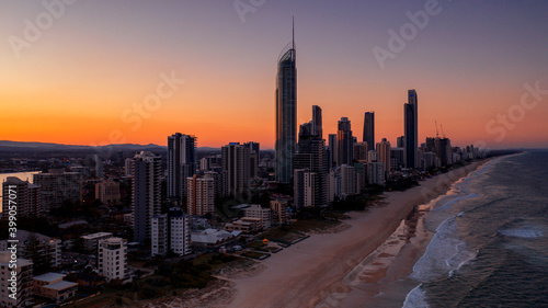 Aerial sunset view over Surfers Paradise beach and skyline