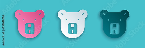 Paper cut Bear head icon isolated on blue background. Paper art style. Vector.