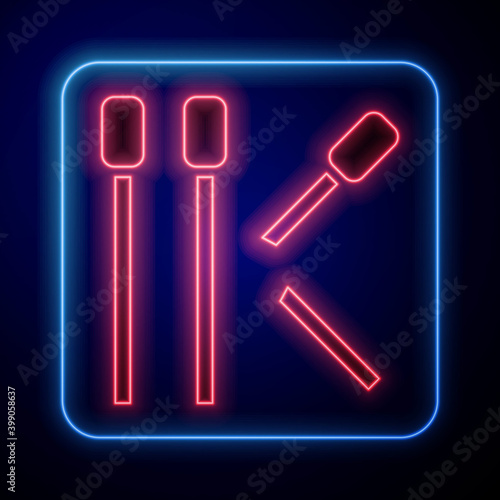 Glowing neon Matches icon isolated on blue background. Vector.