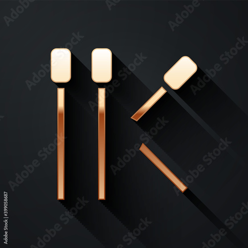 Gold Matches icon isolated on black background. Long shadow style. Vector.