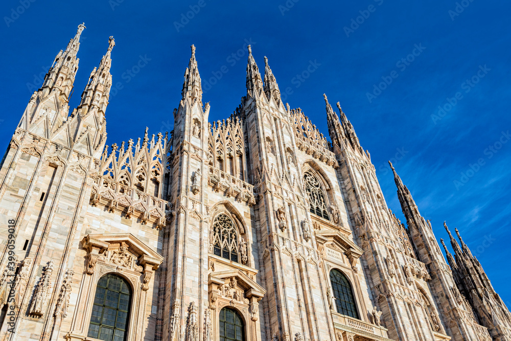 View of the Milan cathedral (Duomo di Milano) on a beautiful day, Milan, Italy