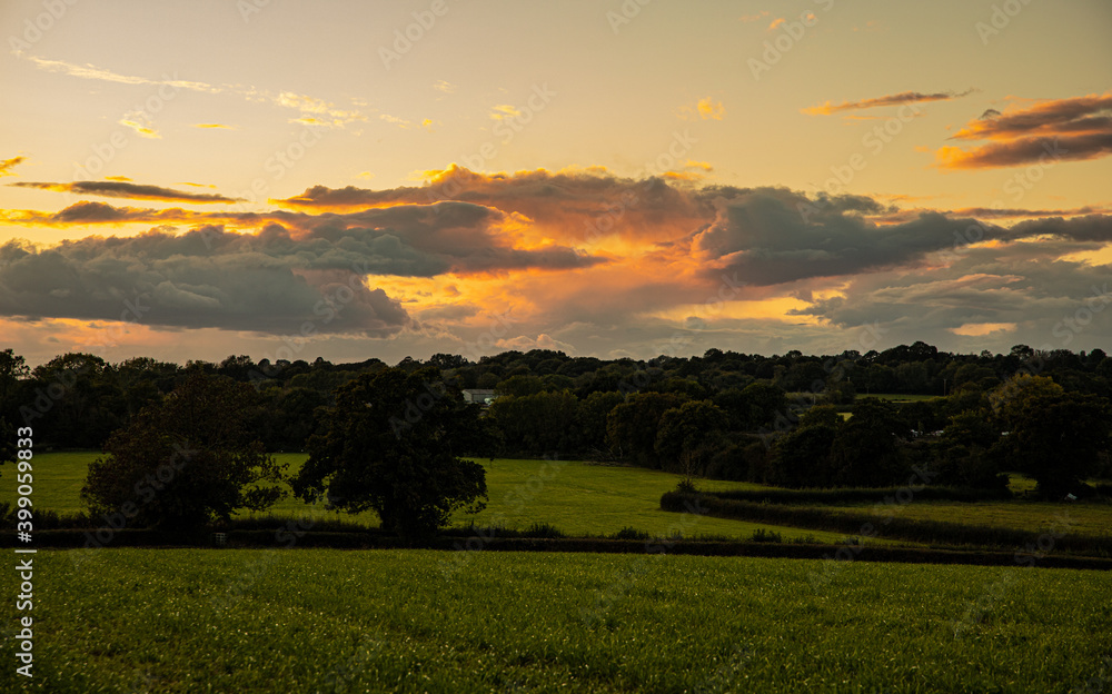 A Sunset Over a countryside