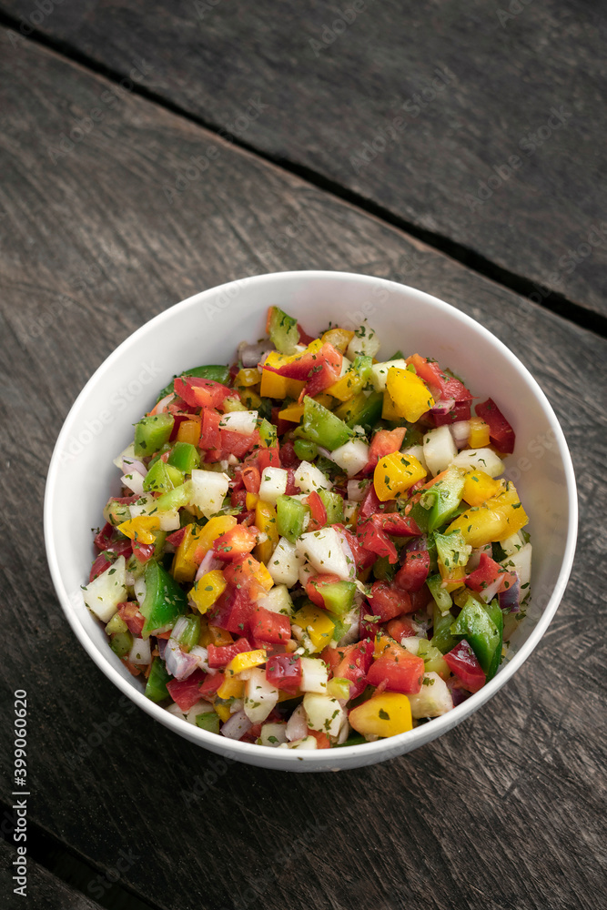 organic salsa salad on rustic old wood backgrond organic salsa salad on rustic old wood backgrond