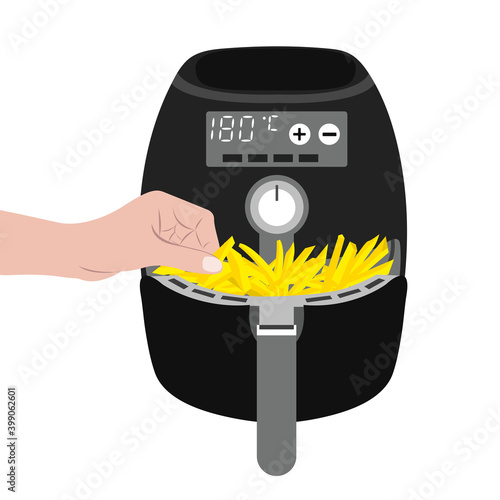 Air fryer kitchen tool with french fries. It's a smart kitchen appliance that cooks by circulating hot air. Hand pulls out French fries from the airfryer