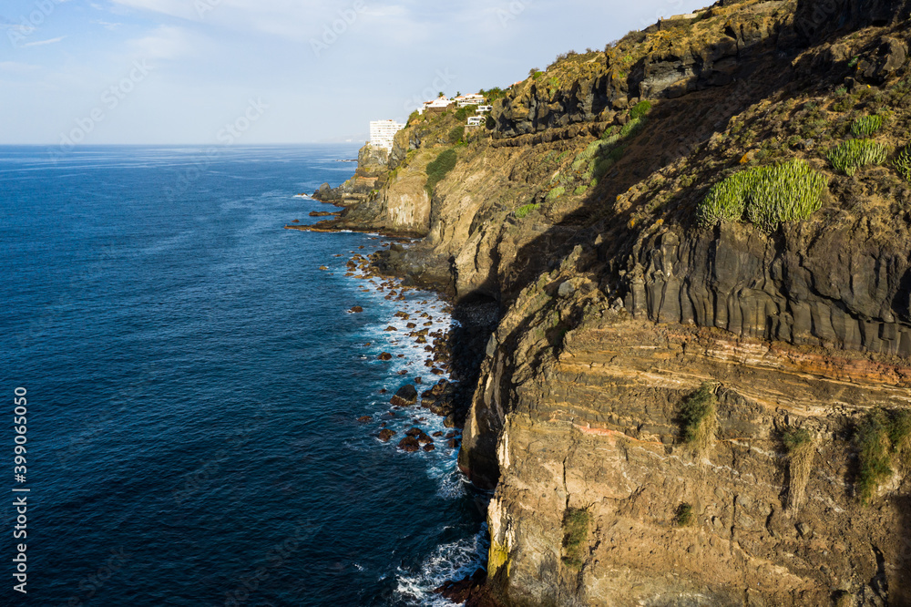 Beautiful cliffs of in Los Realejos by the sea during a sunny day, Tenerife