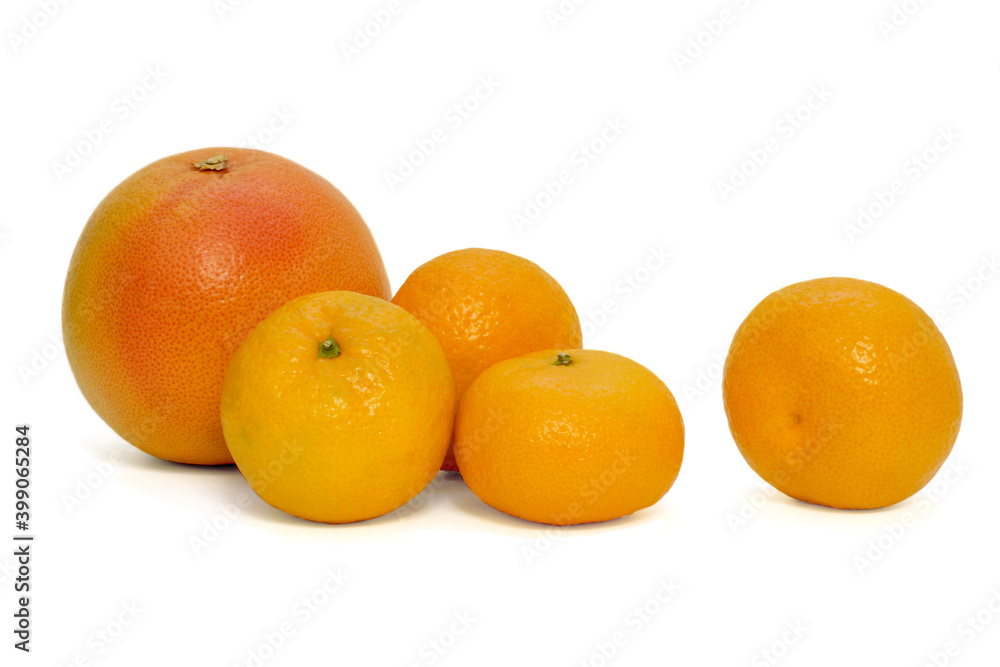 ripe tangerines and grapefruit on a white background ripe tangerines and grapefruit on a white background