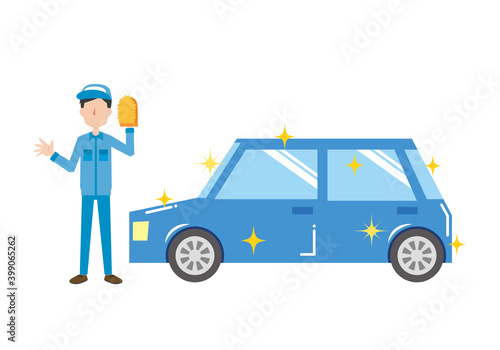 青い車を洗車するスタッフ