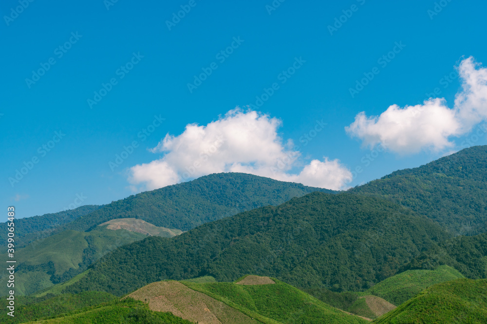beautiful landscape of green mountain with clear blue sky