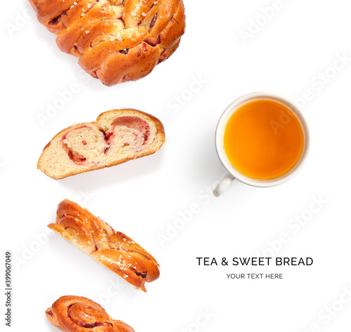 Creative layout made of sweet bread and a cup of tea on the white background. Flat lay. Food concept.