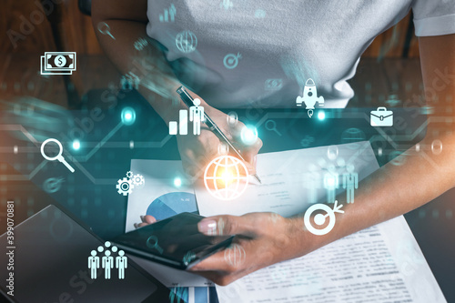 Foto Business analysis hologram and a woman signing contract use phone