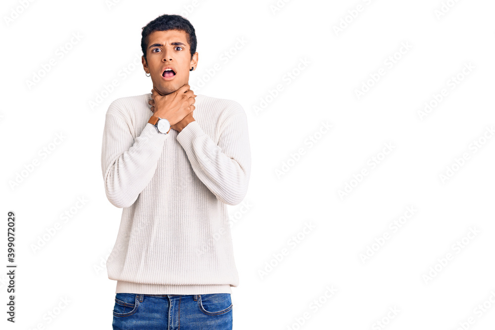 Young african amercian man wearing casual clothes shouting suffocate because painful strangle. health problem. asphyxiate and suicide concept. Young african amercian man wearing casual clothes shouting suffocate because painful strangle. health problem. asphyxiate and suicide concept.