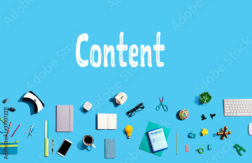 Content concept with collection of electronic gadgets and office supplies