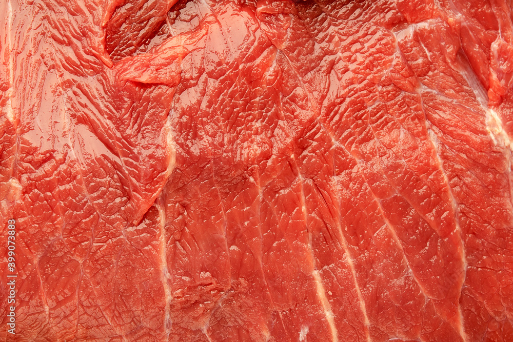 Beef meat texture, close-up. Buffalo fillet close-up, top view. Macro shot of the texture of the meat of a bull, bison, cow. Piece of beef for a steak. Fresh raw piece of beef. Piece of fresh beef. Beef meat texture, close-up. Buffalo fillet close-up, top view. Macro shot of the texture of the meat of a bull, bison, cow. Piece of beef for a steak. Fresh raw piece of beef. Piece of fresh beef.
