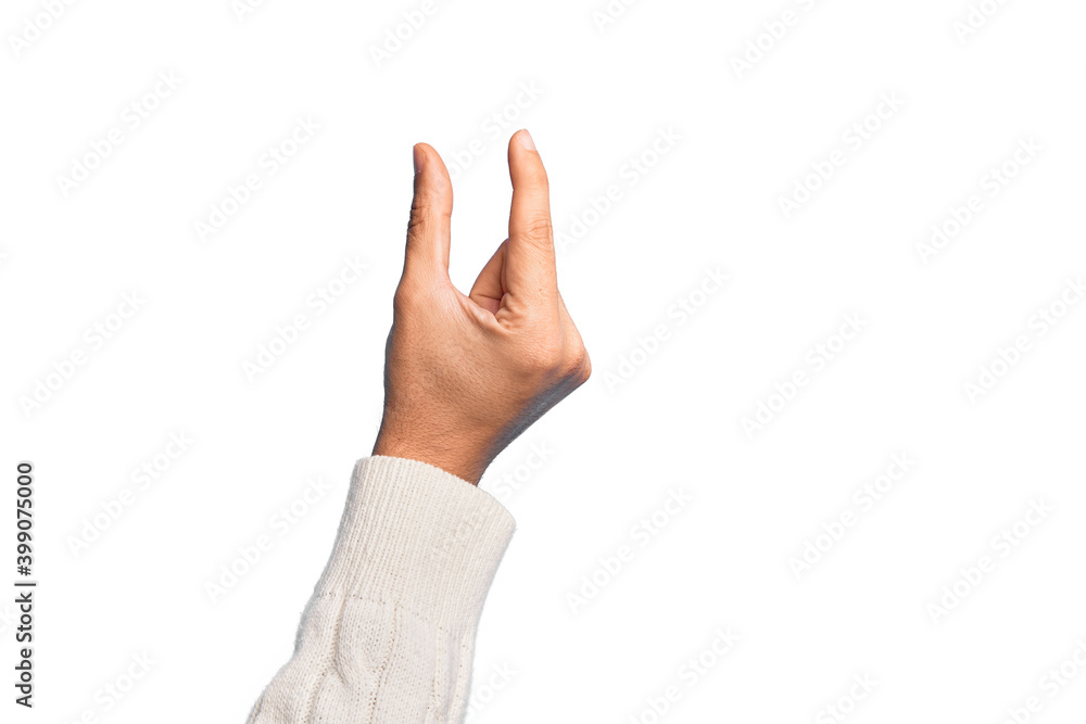 Hand of caucasian young man showing fingers over isolated white background picking and taking invisible thing, holding object with fingers showing space Hand of caucasian young man showing fingers over isolated white background picking and taking invisible thing, holding object with fingers showing space