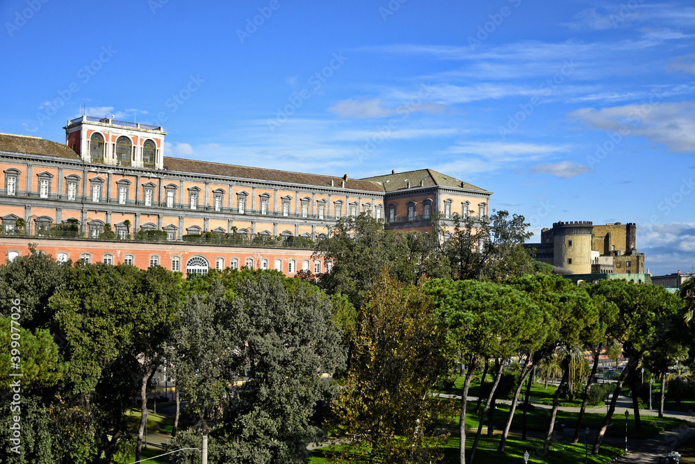 Naples, Italy, December 13, 2020. A facade of the royal palace overlooking the harbor.