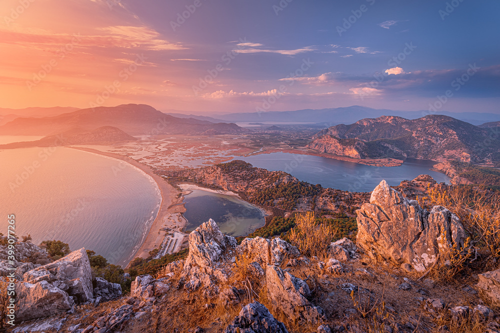 Stunning panoramic view from the top of the mountain to the blue bay and lagoon near the town of Dalyan in Turkey. Famous Mediterranean resorts and the wonders of nature