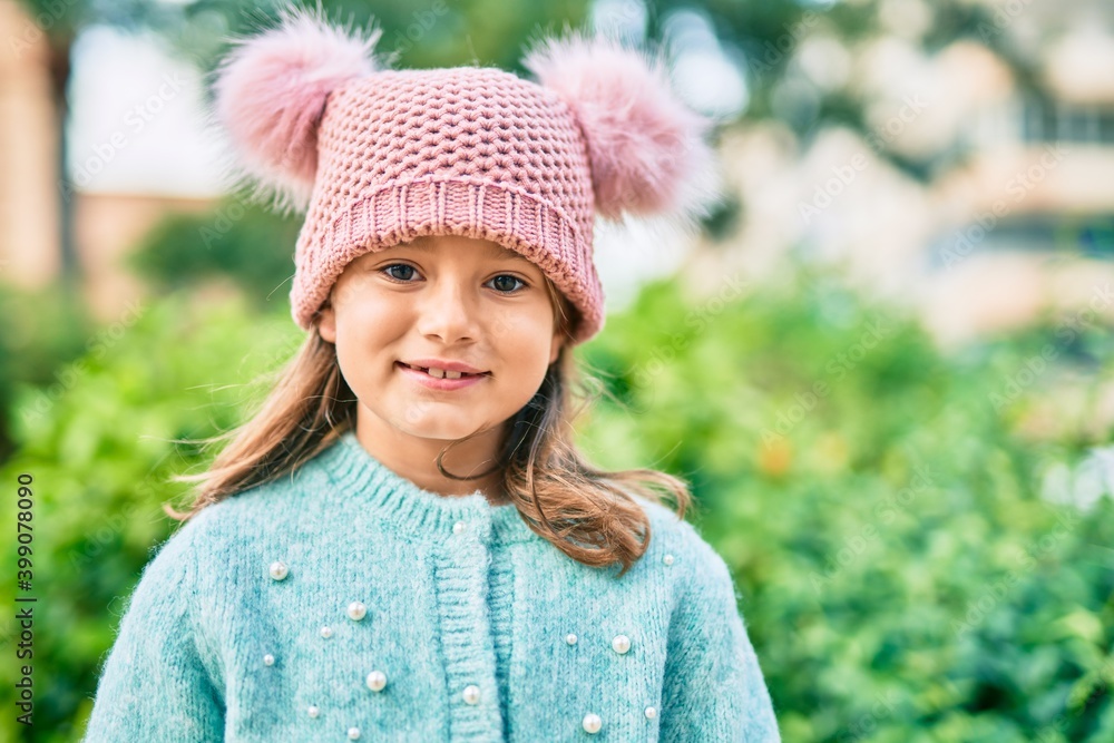 Adorable caucasian child girl smiling happy standing at the park. Adorable caucasian child girl smiling happy standing at the park.