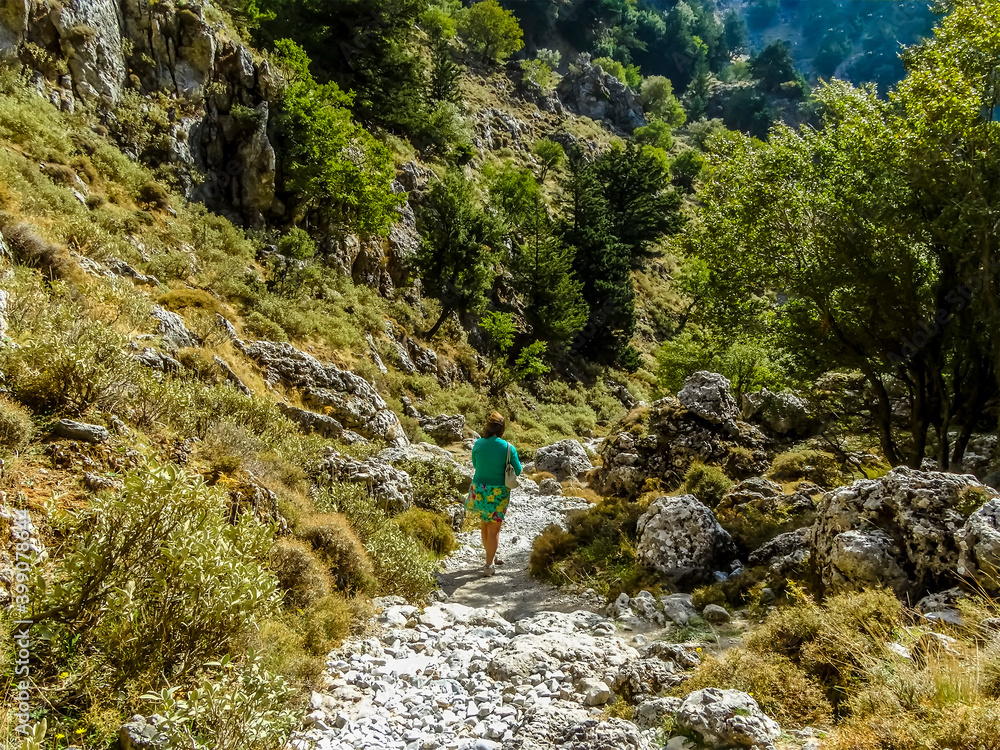 Approaching the deeper section of the Imbros Gorge near Chania, Crete on a bright sunny day Approaching the deeper section of the Imbros Gorge near Chania, Crete on a bright sunny day