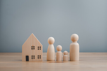 wooden doll family happy face, family home, adoption foster care, homeless support , family mental health, domestic violence, social distancing