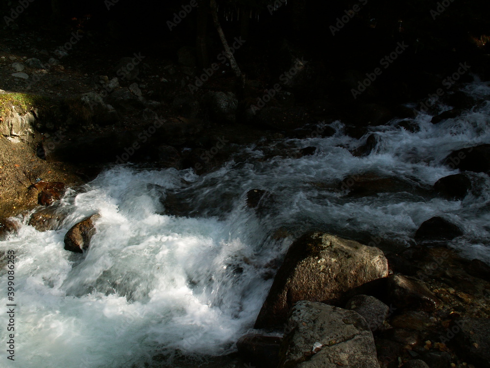 fast mountain river with clear boiling water