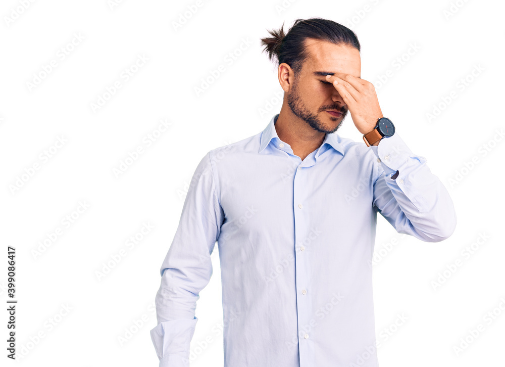 Young handsome man wearing business clothes tired rubbing nose and eyes feeling fatigue and headache. stress and frustration concept. Young handsome man wearing business clothes tired rubbing nose and eyes feeling fatigue and headache. stress and frustration concept.