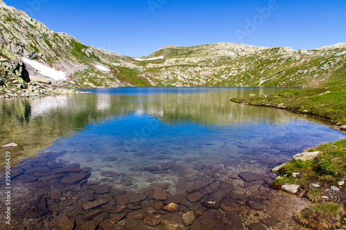 alpine lake in the mountains country 2