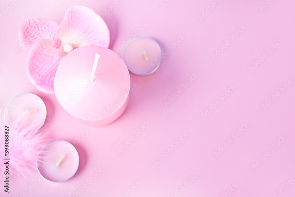 pink spa composition with candles. Aromatherapy, health and beauty care, luxury spa resort concept. pink spa composition with candles. Aromatherapy, health and beauty care, luxury spa resort concept.