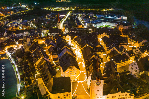 Photography aerial view  of a medieval tow with christmas lights
