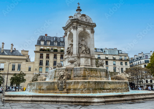 The church of Saint Sulpice in Paris with a beautiful fountain