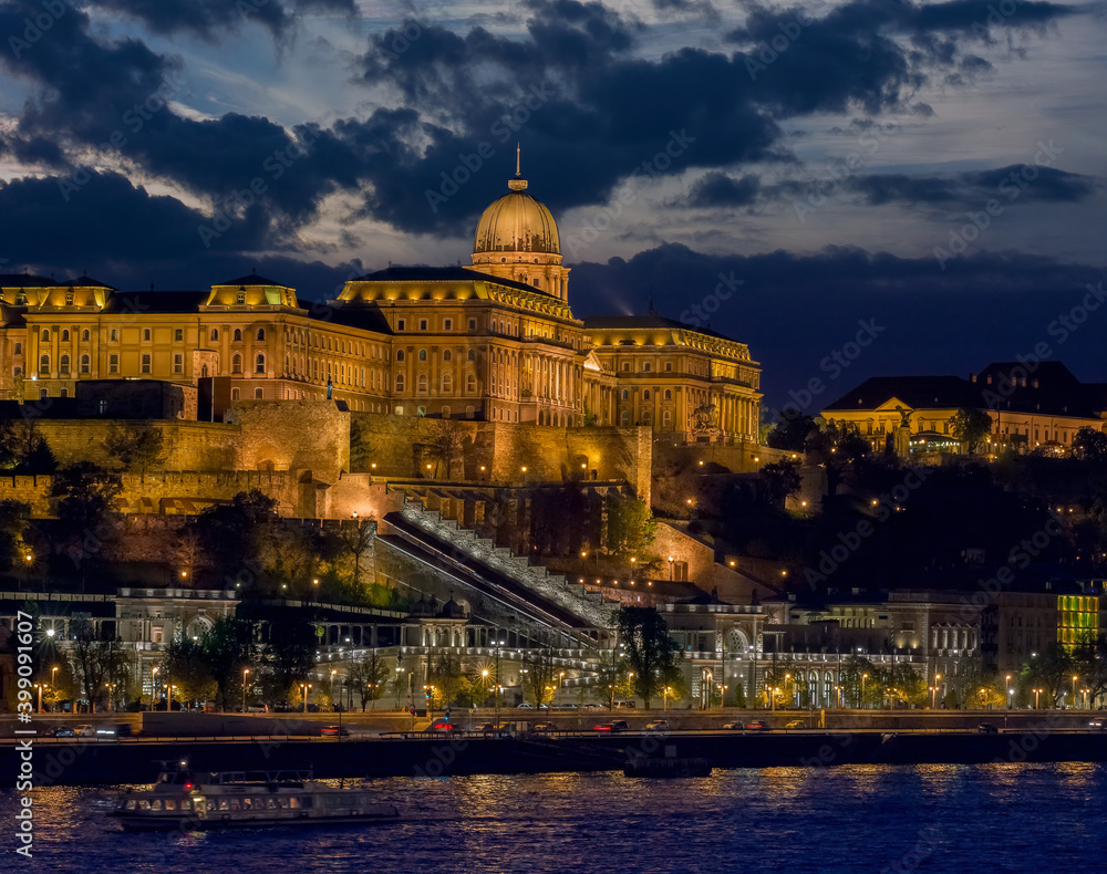View of Royal Castle Budapest, with the Royal Gardens, Castle Garden Bazaar and the Danube river at night