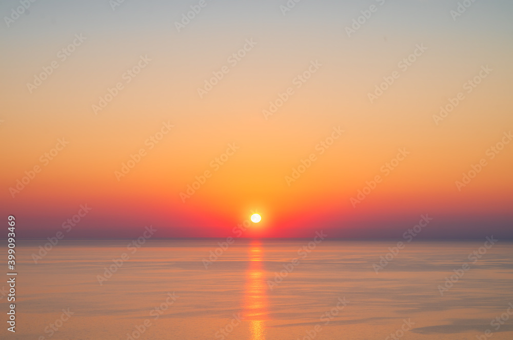 Sunset over open water