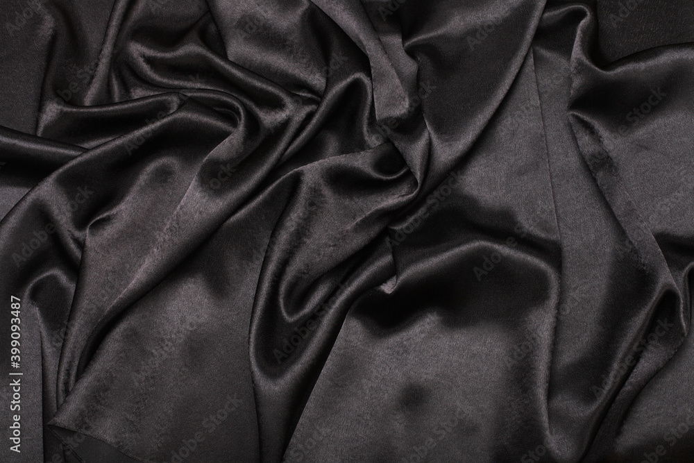 Black wave silk fabric horizontal background Black wave silk fabric horizontal background