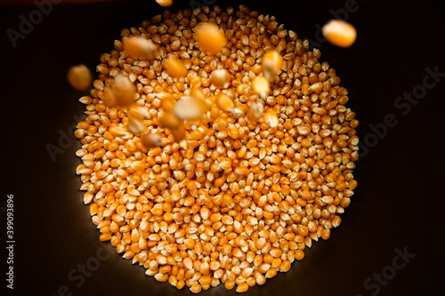 raw popcorn falling, falling popcorn kernel, popcorn kernel rain