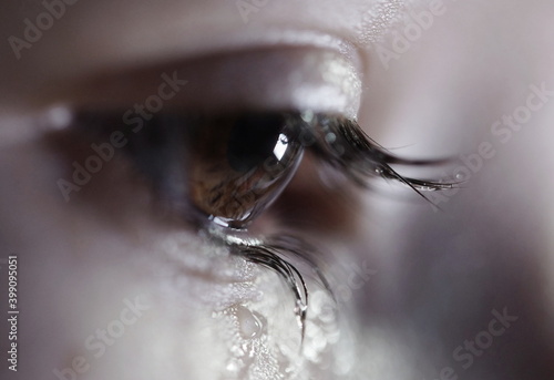 Canvas Print sad eye, close up of crying eye