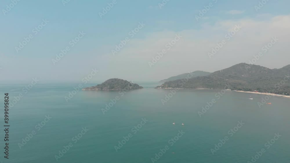 Far away view of Palolem Island Reserve in Palolem Beach in Goa, India - Aerial Wide shot Far away view of Palolem Island Reserve in Palolem Beach in Goa, India - Aerial Wide shot