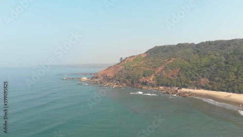 Panoramic view of Arambol beach coastline edge tropical landscape - Aerial Panoramic shot photo