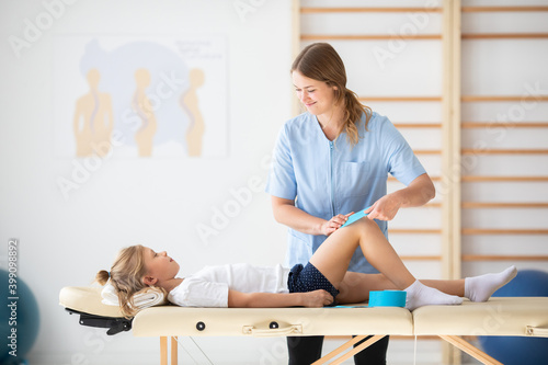 Physical therapist and a girl photo