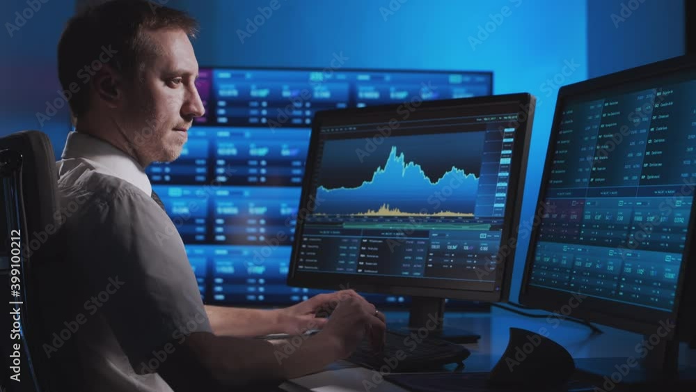 Broker works in office using workstation and analysis technology. Workplace of professional trader. Global financial markets, business, currency exchange and banking concepts. Broker works in office using workstation and analysis technology. Workplace of professional trader. Global financial markets, business, currency exchange and banking concepts.