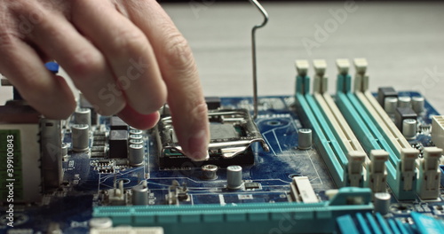 the dolly video of the CPU socket of the computer's motherboard. the concept of computer, motherboard, hardware and technology. © GRAFStock
