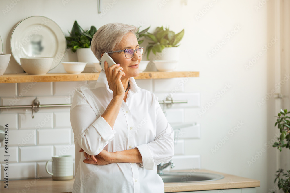 beautiful stylish female aged with a mobile phone beautiful stylish female aged with a mobile phone