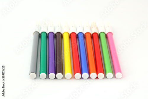Multi-colored markers for drawing. Markers on a white isolated background	