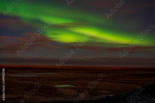 aurora borealis above the clouds