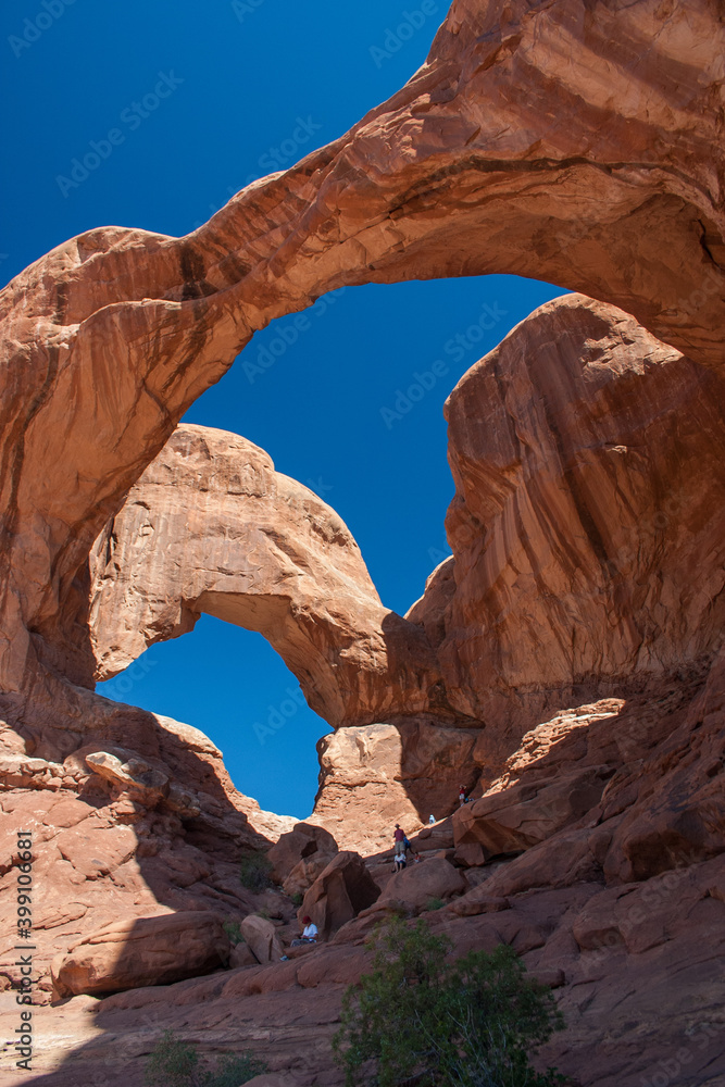 Visitors at Double Arch, Arches National Park