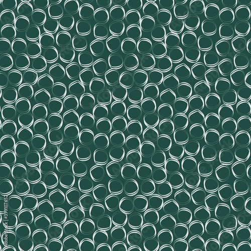 Art deco seamless pattern. Geometric circles on a green and blue background, fabric, wallpaper, packaging, vector ornament
