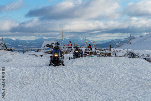 Snowmobiles on mountain Zakhar Berkut  Carpathian mountains in Slavske  Ukraine on January 1  2020. 