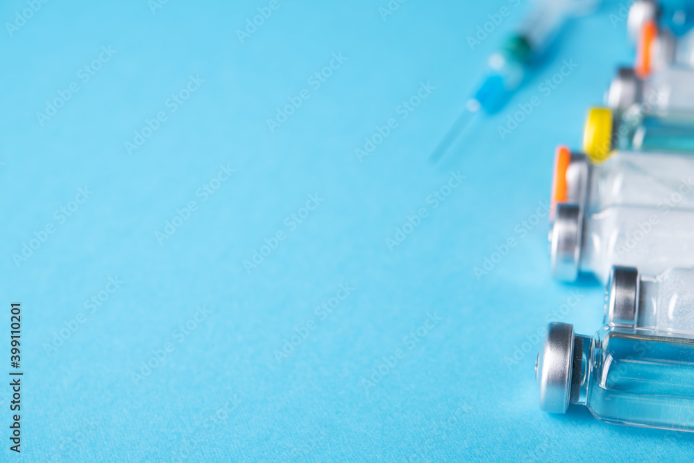 Bottle of coronavirus vaccine with syringe for injection Bottle of coronavirus vaccine with syringe for injection