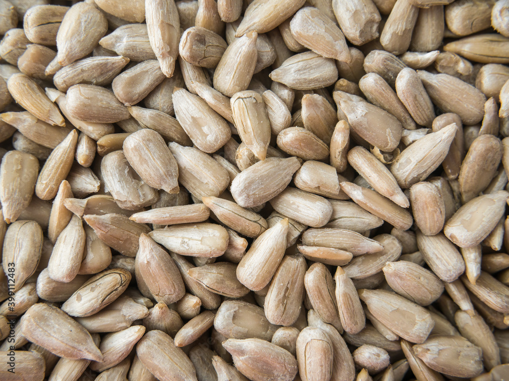 Peeled sunflower seeds background texure. Peeled sunflower seeds background texure.