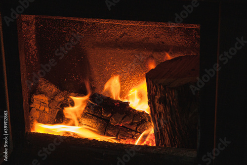 Firewood burning inside of a stove